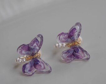 Orecchini unici fatti a mano con fiori freschi conservati