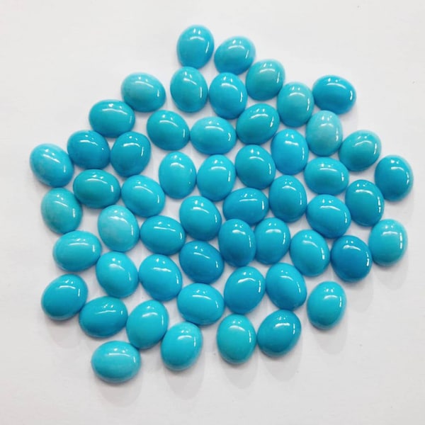 Natural Arizona mines sleeping beauty color turquoise cabochon oval shape gemstone sizes 6x8mm to 10x14mm. American Turquoise for jewelry.