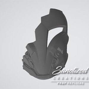 May include: A gray 3D printed helmet with a visor and intricate details. The helmet has a futuristic design and is made of a smooth, matte material.