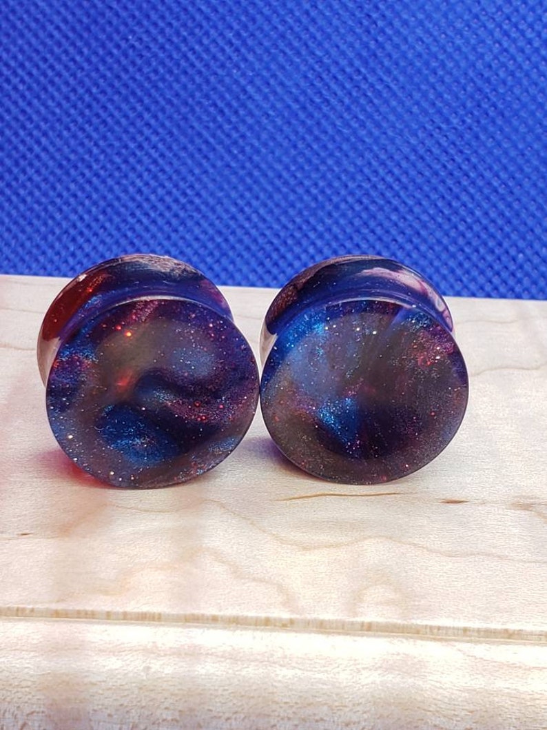 25mm to 40mm Black Walnut and Resin custom cut plugs.