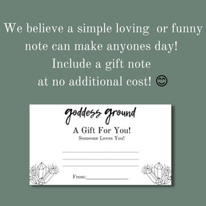 May include: A white gift card with black text that reads "goddess ground A Gift For You! Someone Loves You!" and a black line for writing a message. The card has a black and white illustration of crystals at the bottom.