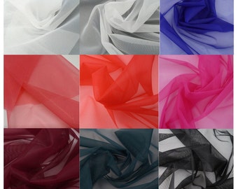 May include: A collection of nine fabric swatches in various colours, including white, red, pink, burgundy, teal, and black. The fabric is a sheer, lightweight mesh.