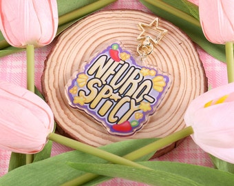 Llavero acrílico con dije neuropicante: autismo, TDAH y salud mental