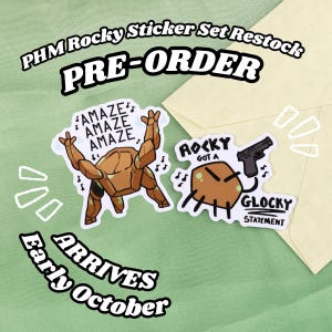 May include: Two die-cut stickers featuring a brown rock character. One sticker shows the character with arms raised and the text AMAZE AMAZE AMAZE. The other shows the character holding a black handgun with the text ROCKY GOT A GLOCKY STATEMENT.