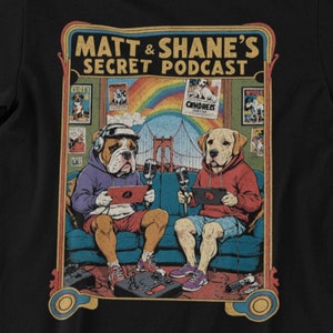 Matt and Shane&#39;s Secret Podcast T-Shirt | Funny Dog Hosts Design | Comedy Podcast Fan Gift | Rainbow Retro MSSP Tee