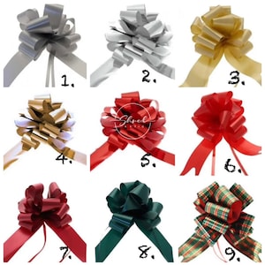 May include: Nine different colours of gift bows, including silver, gold, red, and green. The bows are arranged in a grid pattern, with each bow numbered 1 through 9.
