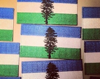 Cascadia Doug Flag Iron On Patch