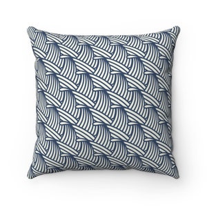 May include: A square throw pillow with a navy blue and white geometric pattern. The pattern is made up of repeating curved lines that create a wave-like effect.