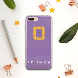 May include: Purple phone case with a yellow Friends logo and the word "FRIENDS" in yellow letters.