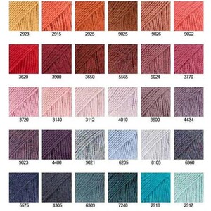 Pode incluir: Uma carta de cores de amostras de fio, com cada amostra etiquetada com um n&uacute;mero. As cores incluem branco, bege, cinza, preto, marrom, laranja, vermelho, rosa, roxo, azul, verde e amarelo.