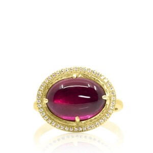 rubellite tourmaline cabochon ring. 18k gold yellow gold tourmaline ring. tourmaline gold and diamond ring. helo ring with engraving.