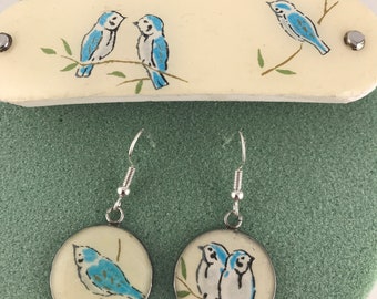 Handmade hair barrette clip for thin to medium hair with matching pierced earrings. Measures 3.5” Bluebirds on yellow background.