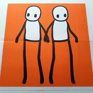 Stik Artista de graffiti británico Holding Hands Orange Hackney Periódico Today Sin firmar Edición abierta.