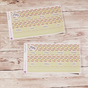 May include: Two planner sticker sheets with a floral design in pink, yellow, and orange. The word "May" is written in cursive. Days of the week and "notes" are also included. The sheets are labeled "Monthly Ka Sa S" and "Monthly Ka Sa M".