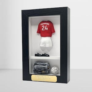 Vencedores da FA Cup '24 (Man Utd) - KitBox® comemorativo da lenda do futebol