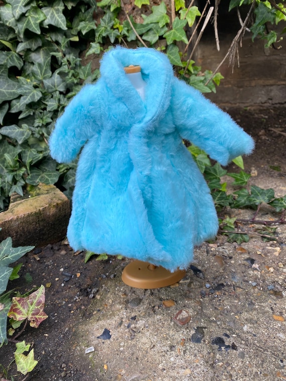 Dolls baby blue fur coat with lace trimming and faux buttons suitable for a standard 11.5inch fashion doll