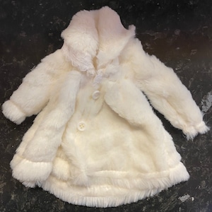 Dolls white fur coat with lace trimming and faux buttons suitable for a standard 11.5inch fashion doll