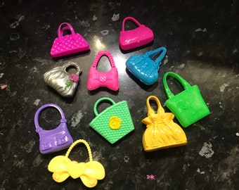 10x Plastic dolls accessories/ handbags made for 11.5inch fashion doll, colours and designs will vary! Doll and mirror not included