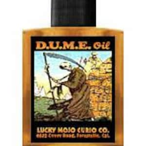 May include: A glass bottle with a black cap and a yellow label that reads "D.U.M.E. Oil" and "Lucky Mojo Curio Co.". The label features a cartoon image of a skeleton holding a scythe.