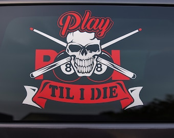 May include: A black and red decal featuring a skull with crossed pool cues. The words "Play Pool Til I Die" are displayed in a stylized font. Two eight balls are visible.