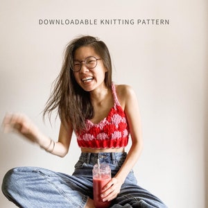 May include: A woman wearing a pink and red crocheted bralette with the text "Social Bubble Bra(lette)" and "By Brenda Lam" below the image.