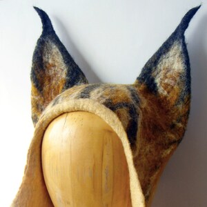 Animal Hat imitating Head Of A Caracal With Ears And Tassels On Them For Those Who Already Have Everything To Order