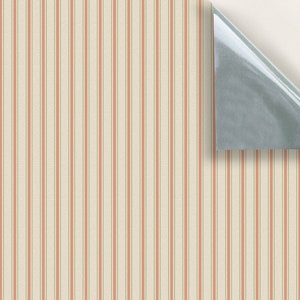 May include: A roll of wallpaper with a vertical striped pattern. The stripes are alternating red and cream.
