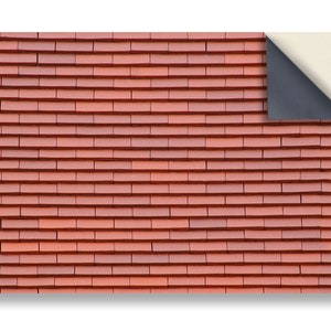 Könnte beinhalten: Nahaufnahme einer roten Backsteinmauer mit strukturierter Oberfläche. Die Steine sind versetzt angeordnet und erzeugen ein optisch ansprechendes und klassisches Aussehen.