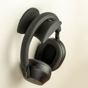 Soporte flotante para auriculares / Soporte para auriculares montado en la pared / Almacenamiento compacto para auriculares