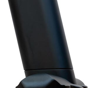 May include: A matte black furniture leg attachment featuring a molded, claw-like base that securely grips a bright yellow tennis ball. The cylindrical leg extends upward, while the base provides a stable, cushioned contact point for floor protection.