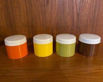 Tupperware, set of 4, stackable spice container, spice shakers, brown, yellow, orange and green with lids