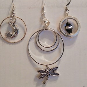 Delicate silver ring earrings. Please choose from moon or dragonfly.