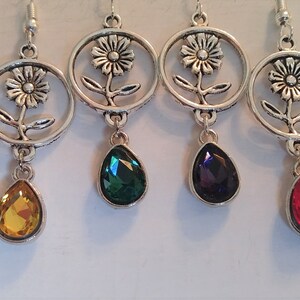 Metal flower with colored drop earrings. Six colors available, sold separately.