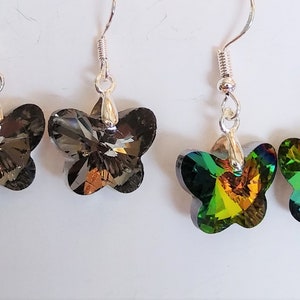 Shimmering glass butterfly earrings. Please choose from shimmering black or rainbow.