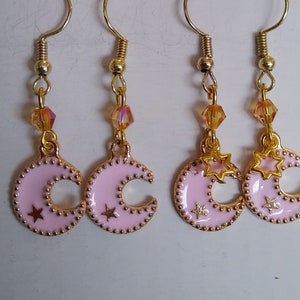 Pink colored moon earrings. Two styles, sold separately. Please choose, golden bead or star.