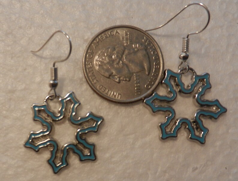 Blue colored snowflake earrings.