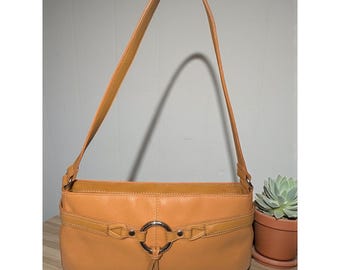 The Sak Shoulder Bag Tan Pebbled Leather Silver Ring Tassel Accents Top Zip Boho
