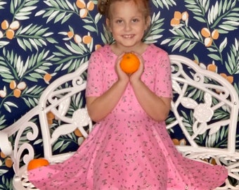 Girls' Twirly Dress: Low Back, Short Sleeves, Multiple Prints