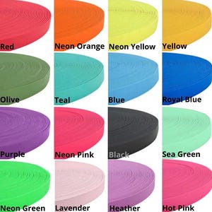 May include: A collection of 14 different colored elastic bands, each rolled up and displayed in a grid pattern. The colors include red, neon orange, neon yellow, yellow, olive, teal, blue, royal blue, purple, neon pink, black, sea green, neon green, lavender, heather, and hot pink.