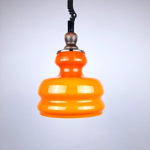 Mid-century orange glass pendant lamp Yugoslavia 1970s Retro lighting Space age