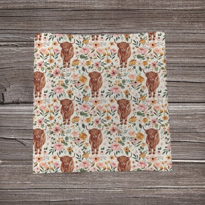 May include: A seamless pattern featuring brown Highland cows with floral accents in shades of pink, yellow, and green on a white background.