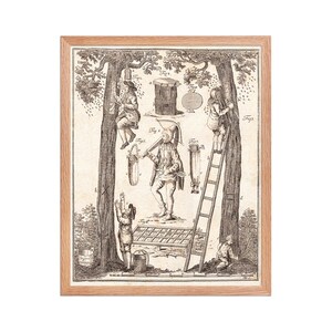 May include: A framed vintage print depicting a beekeeping scene. The black and white illustration shows figures climbing trees, using ladders, and handling equipment. The print is in a light brown wooden frame.