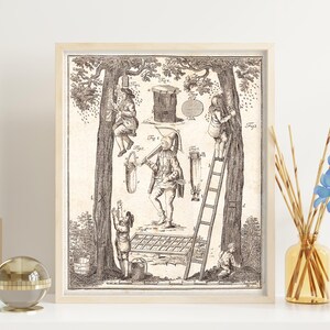 May include: A framed vintage print depicting a beekeeping scene with figures interacting with trees, ladders, and a beehive. The artwork is in black and white, with detailed illustrations of tools and activities. The frame is a light wood color.