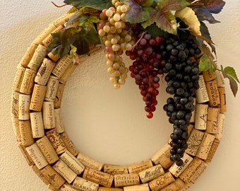 Wine Cork Wreath with Grape varieties, 16” diameter, attached metal D-ring hanger.