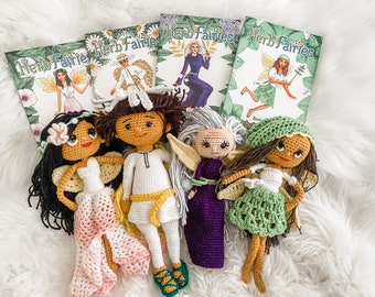 May include: A collection of handmade crochet dolls and books titled "Herb Fairies." The dolls feature detailed crochet work, with various hair colors, outfits, and accessories. The book covers display illustrations of fairies with floral and leaf accents.
