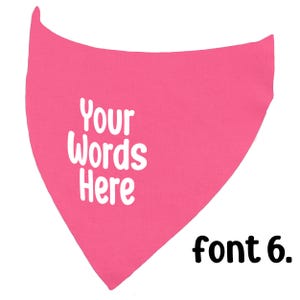 May include: A bright pink bandana with the text "Your Words Here" in white, stylized font. The words are centered on the bandana. The text "font 6." is in black, in the bottom right corner.