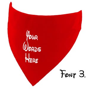 May include: A red bandana with the text "Your Words Here" in white script. The phrase "Font 3" is written in black script in the lower right corner. The bandana is triangular in shape.
