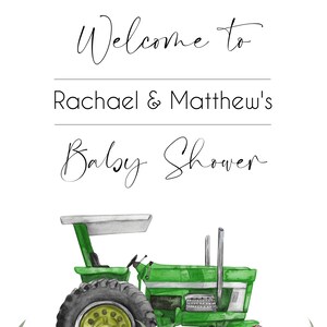 May include: Welcome to Rachael & Matthew's Baby Shower. A green tractor with a white roof is in a field of green grass.