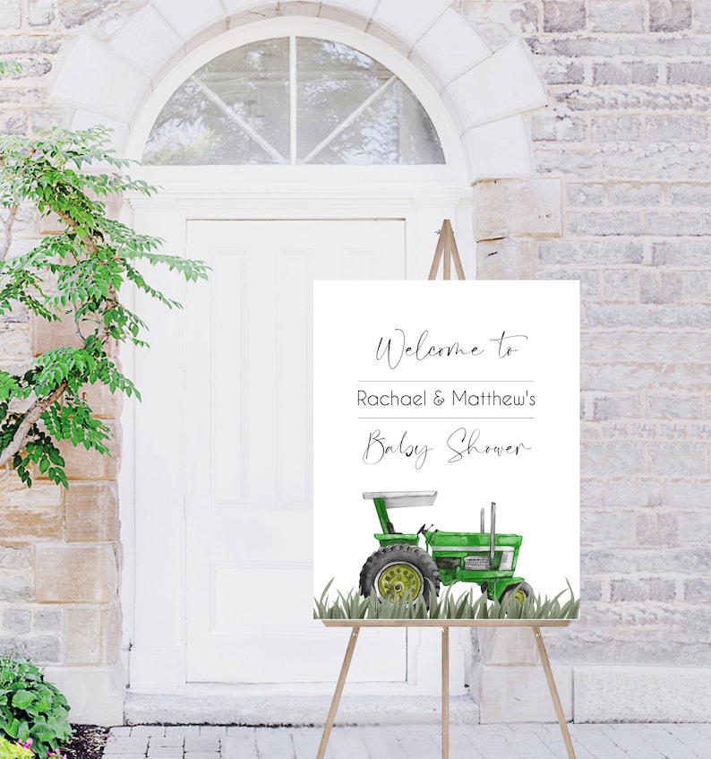 May include: Welcome to Rachael & Matthew's Baby Shower sign with a green tractor illustration.