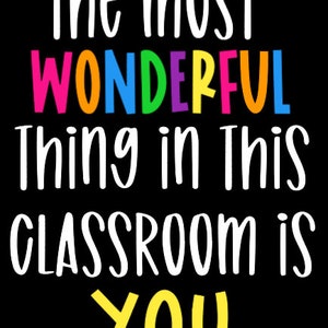 May include: A black and white classroom sign with the text "The most wonderful thing in this classroom is YOU" in white. The word "wonderful" is in rainbow colors.